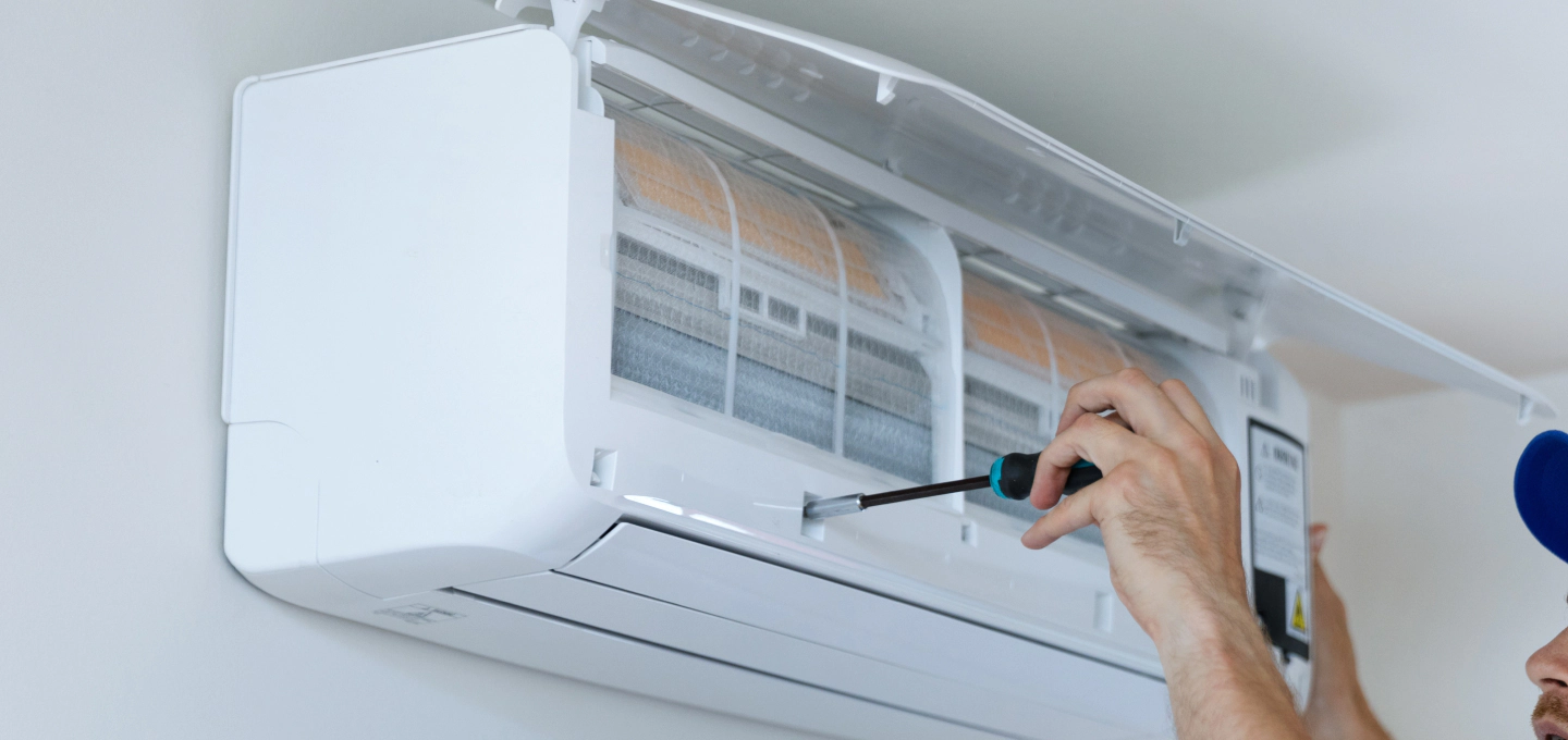 technician doing a mini split installation